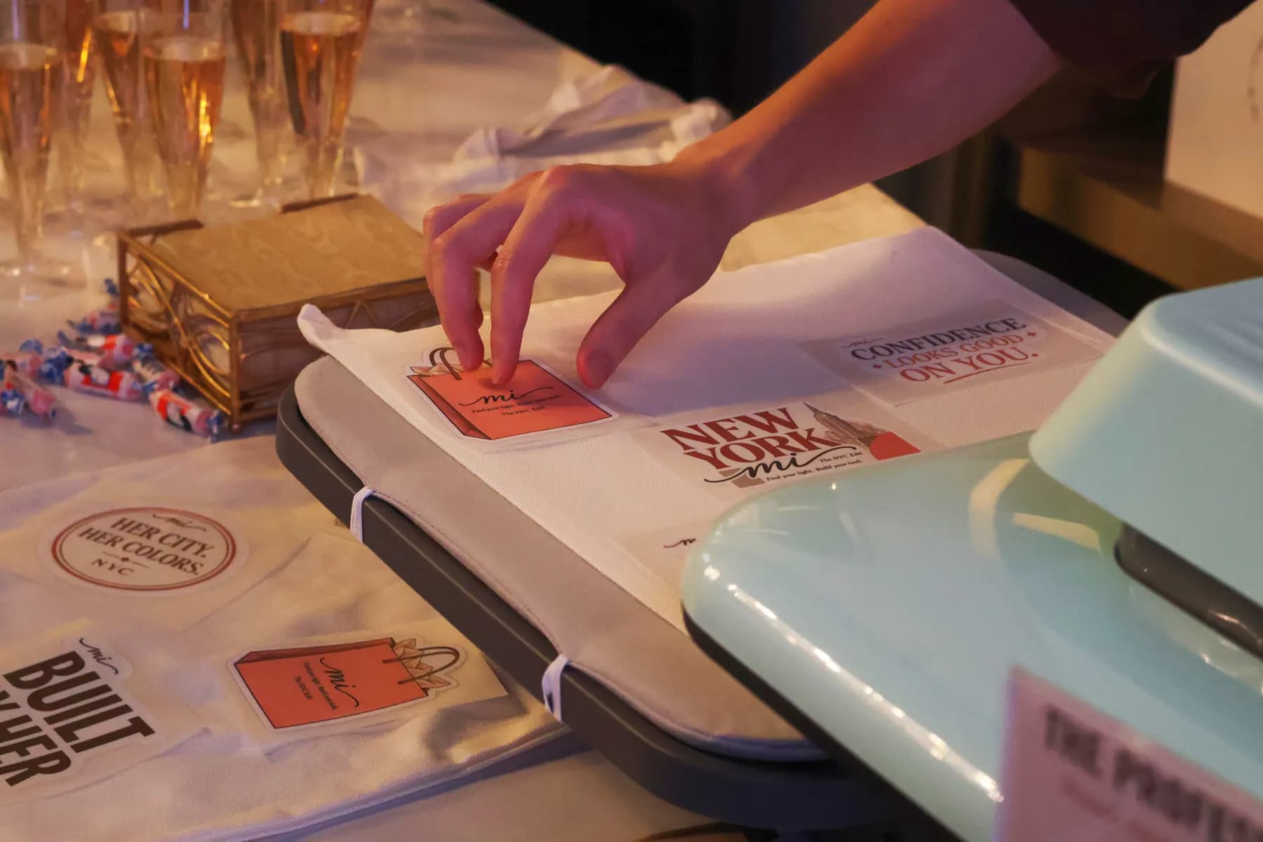 A guest customizes a MiPalette canvas tote at the NYC Pop-Up.