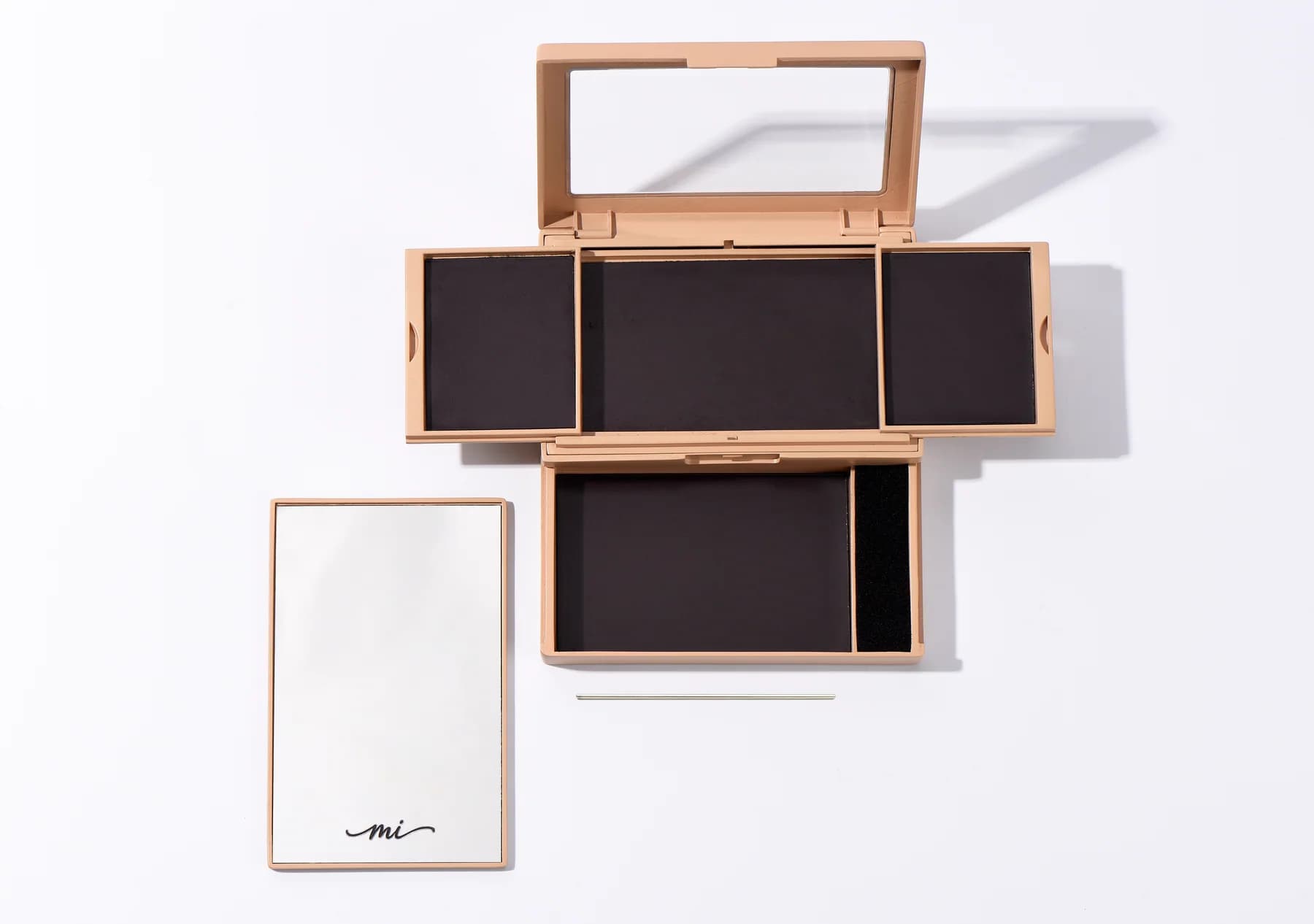 Open light tone MiPalette compact with mirror and pan-release tool