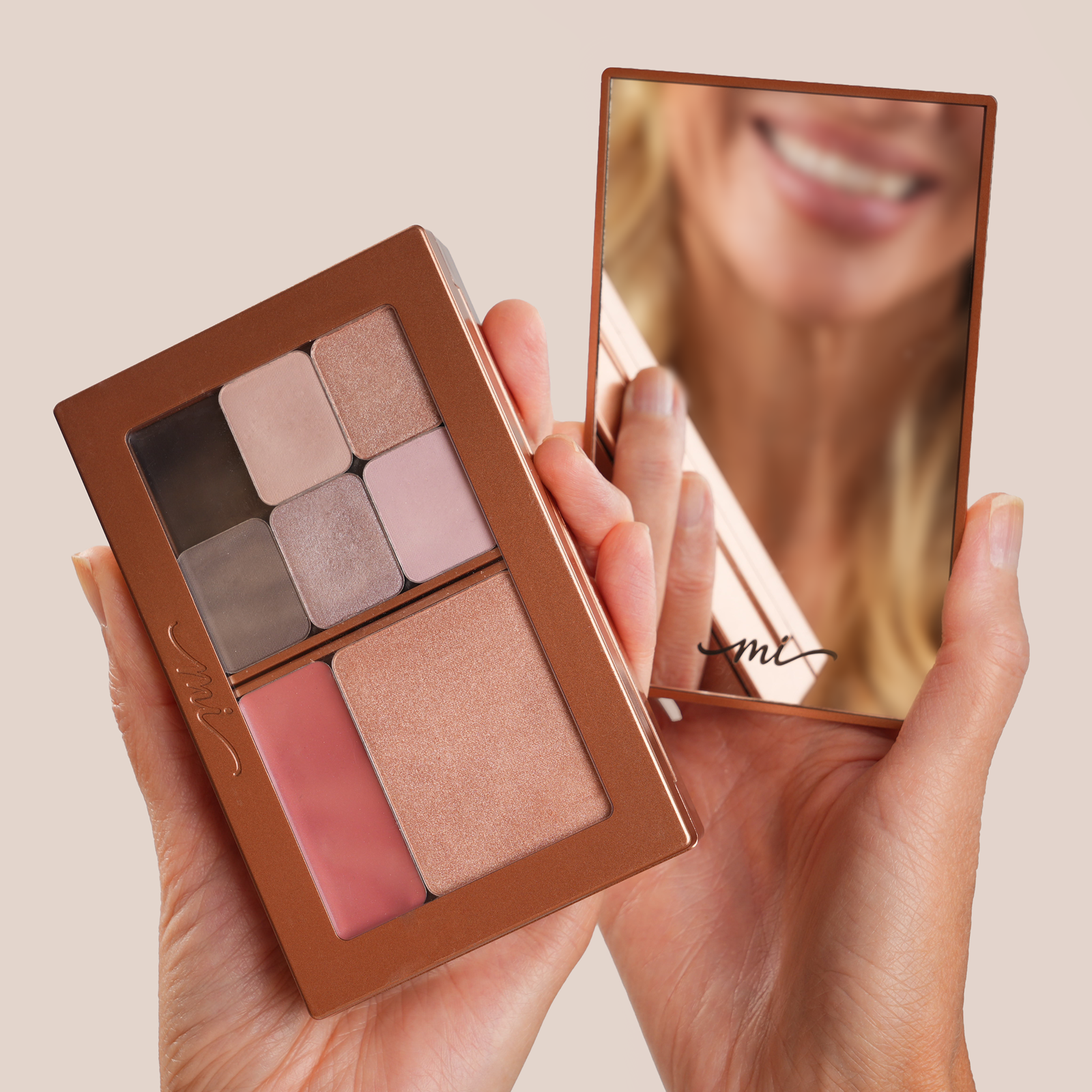 MiPalette shades with a smiling reflection in the detachable mirror.